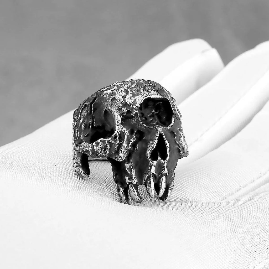 A retro-style alloy ring with a one-eyed skull design, shown in silver tone.