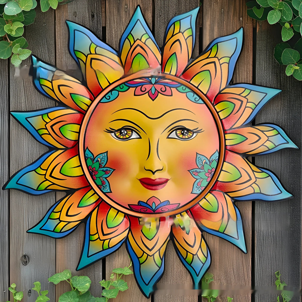 Circular iron sun face metal wall hanging with radiating rays, shown in a gold finish.