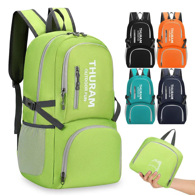 Outdoor folding rucksack in dark blue with air pillow belt system showing 20-35 litre capacity