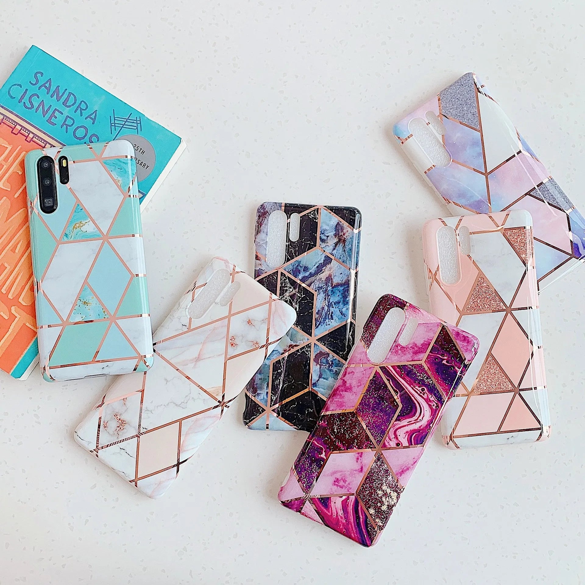 Electroplated marble pattern TPU back cover case for a mobile phone.