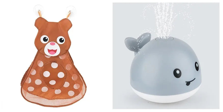 White and blue electric whale bath toy spraying water with flashing lights on a bathroom surface.