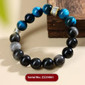 Geometric peacock blue tigereye bracelet with round elements on wrist