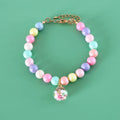Colourful resin pearl collar and bracelet set for a small dog, shown in a macaron colour option.