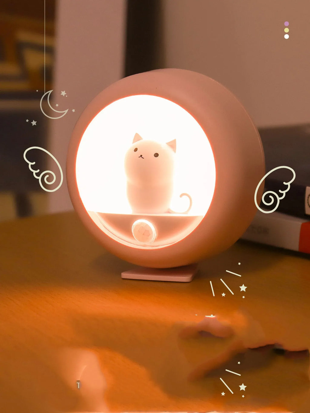 A white bedside sleep lamp for babies with orange, pink, and white light options and a projection feature on a nursery table.
