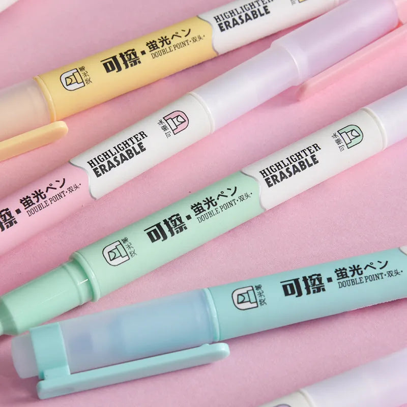 Six double-headed fluorescent marker pens in plastic casing with various coloured barrels