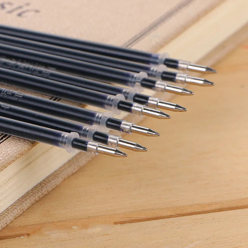 Automatic fade and disappear pen set showing pen holder and eight refill cartridges