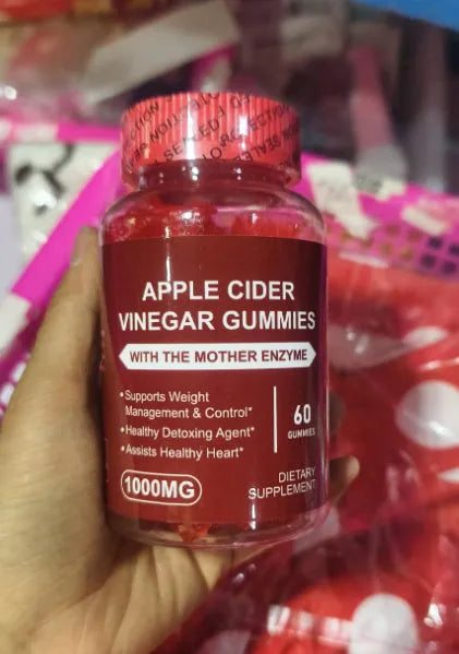 Bottle of apple cider vinegar gummy supplements containing 60 chewable tablets for adults