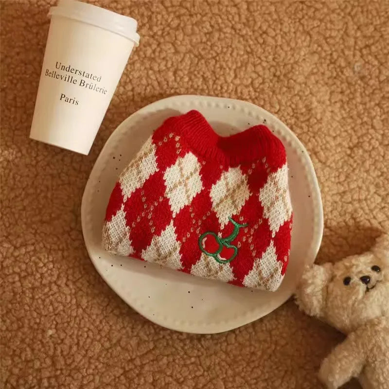 Red cat sweater with embroidered cherry pattern showing size chart for XS to XL.