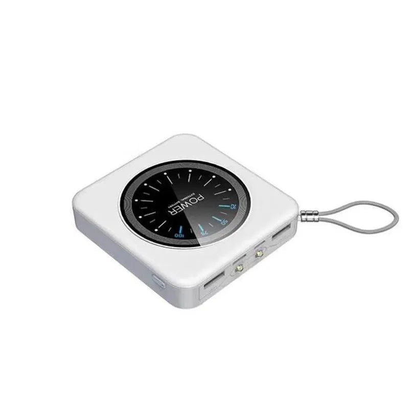 Mini clock charger in alloy case showing multi-U ports, displayed next to a coin for scale