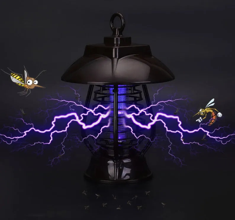 Black solar mosquito lamp with integrated solar panel for garden outdoor insect control