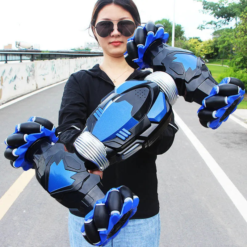 Blue electric remote control car with two motors, ABS plastic body, climbing and twisting wheels, on a pavement surface