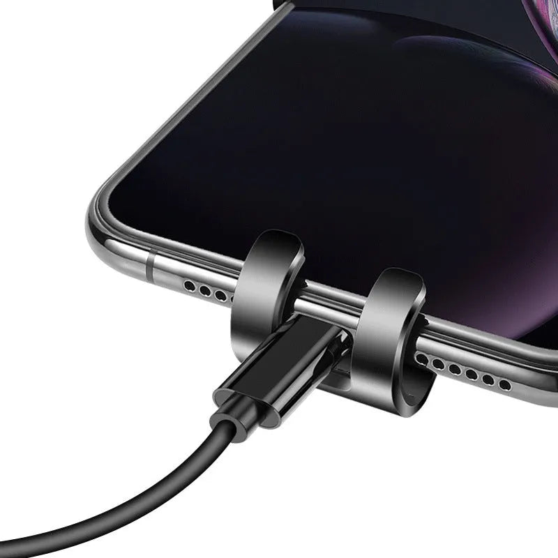 Black S4 gravity mirror ABS mobile phone bracket attached to car air conditioning port holding smartphone