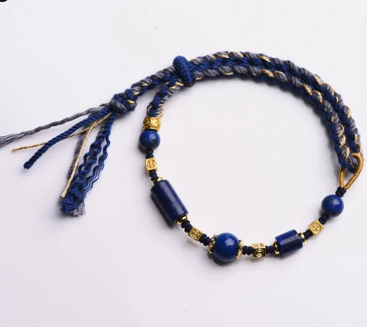 Hand woven DIY watch bracelet with lapis lazuli coloured rope and flexible wire in an ethnic style.