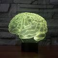 3D acrylic brain-shaped LED desk lamp with colourful lighting on a black ABS base.