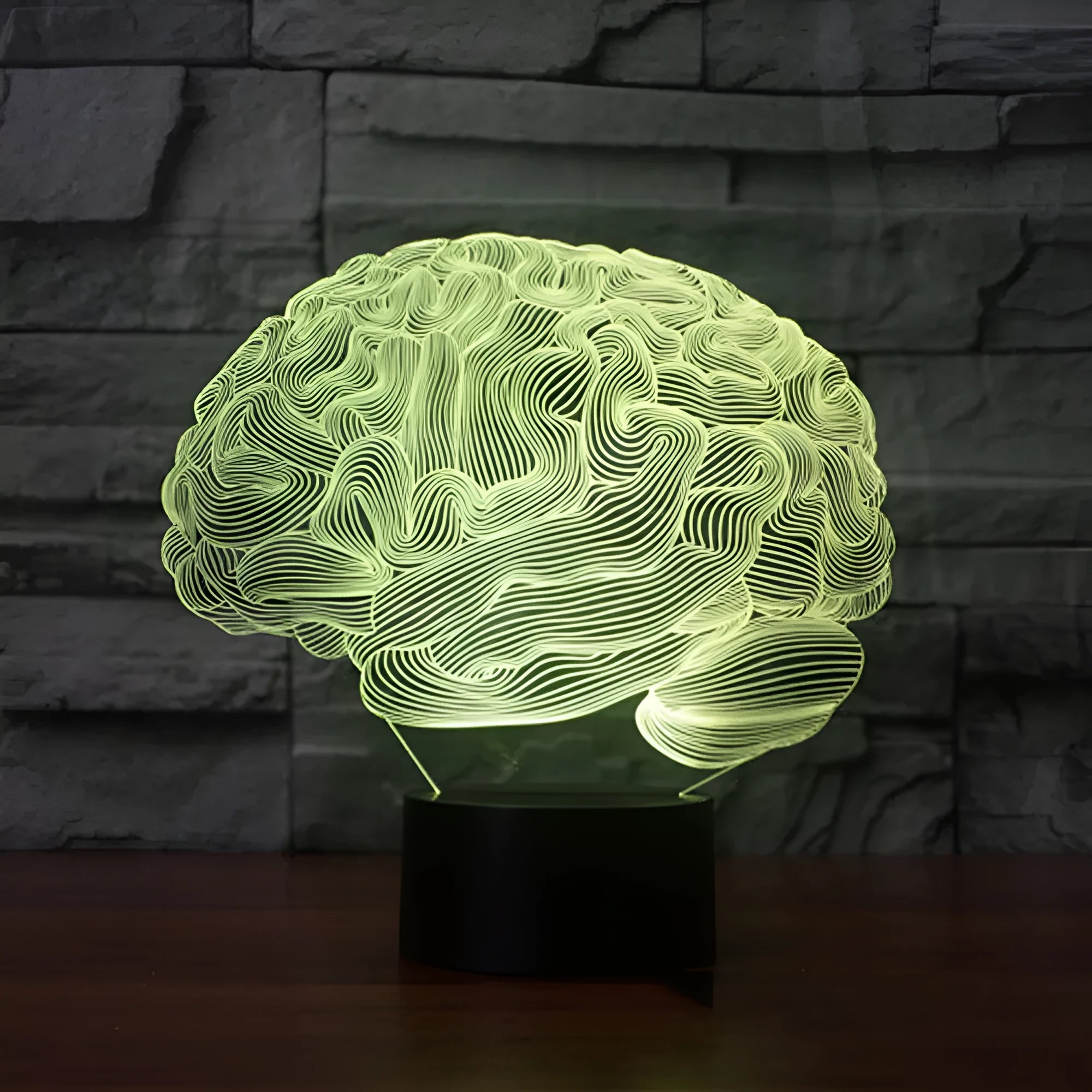 3D acrylic brain-shaped LED desk lamp with colourful lighting on a black ABS base.