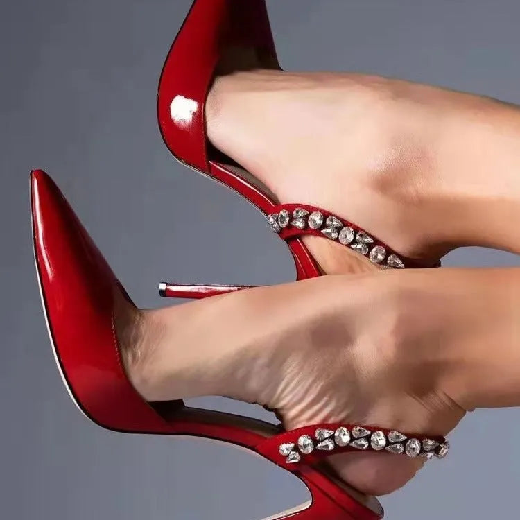Women's black pointed toe high heel sandals with rhinestone side accents showing 11cm heel height