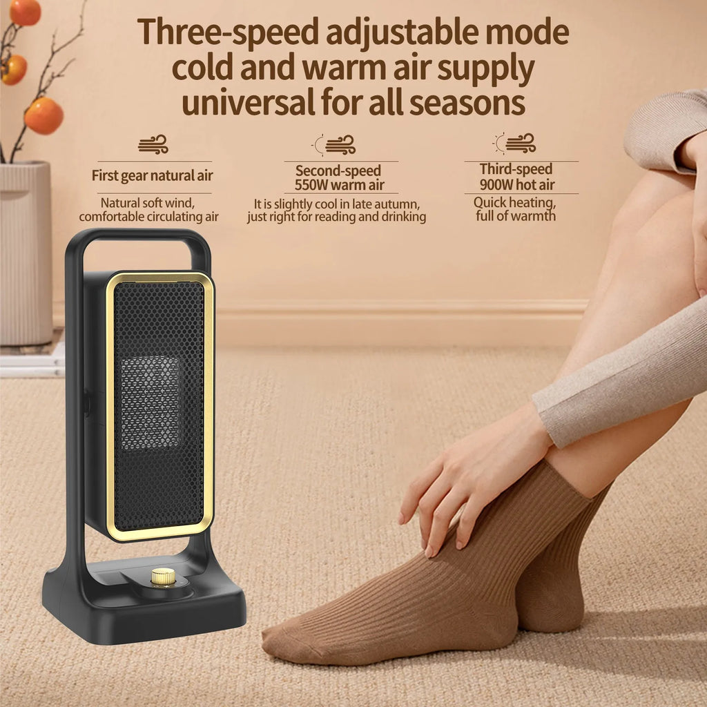 Compact black PTC ceramic desktop air heater with control knob on a wooden desk.