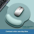 Silicone wristband mouse mat with gradient design measuring 220mm by 250mm on desk