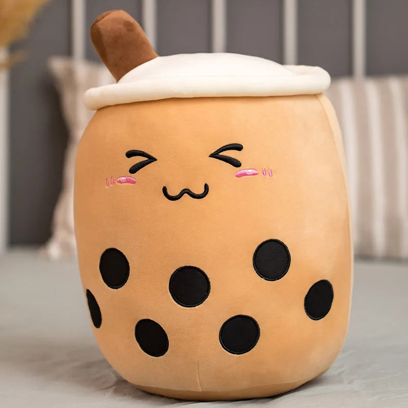 Brown boba milk tea cup shaped soft teddy plush toy on a white background.
