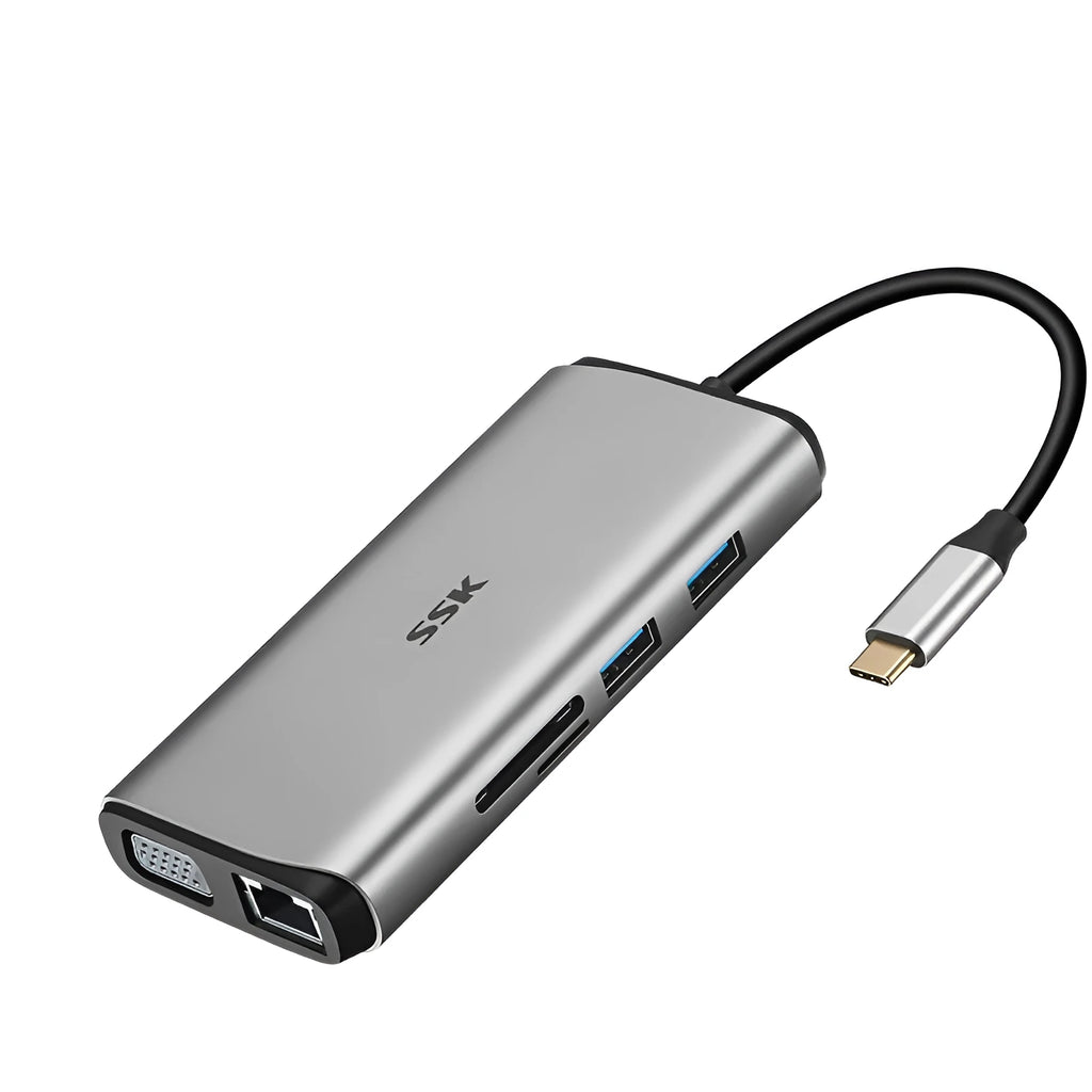 Grey 11-in-1 USB-C docking station with HDMI, VGA, USB ports, Ethernet, and card reader on a desk.