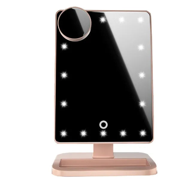 Pink touch screen makeup mirror with ring of 20 LED lights and Bluetooth speaker.