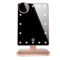 Pink touch screen makeup mirror with ring of 20 LED lights and Bluetooth speaker.