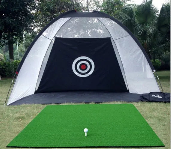 Black and green golf practice net tent set up on grass with fibreglass poles and target sheet