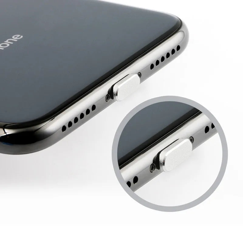 Aluminium alloy iPhone charging port dust plug shown in gold, silver, and rose gold colours.