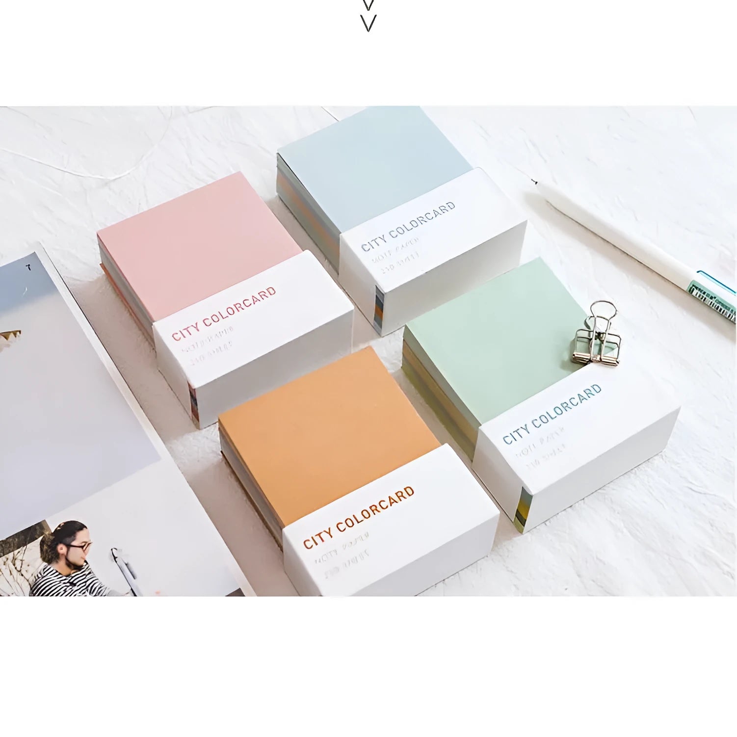Rectangular memo note pad with creative city colour design, measuring 75 by 95 millimetres.