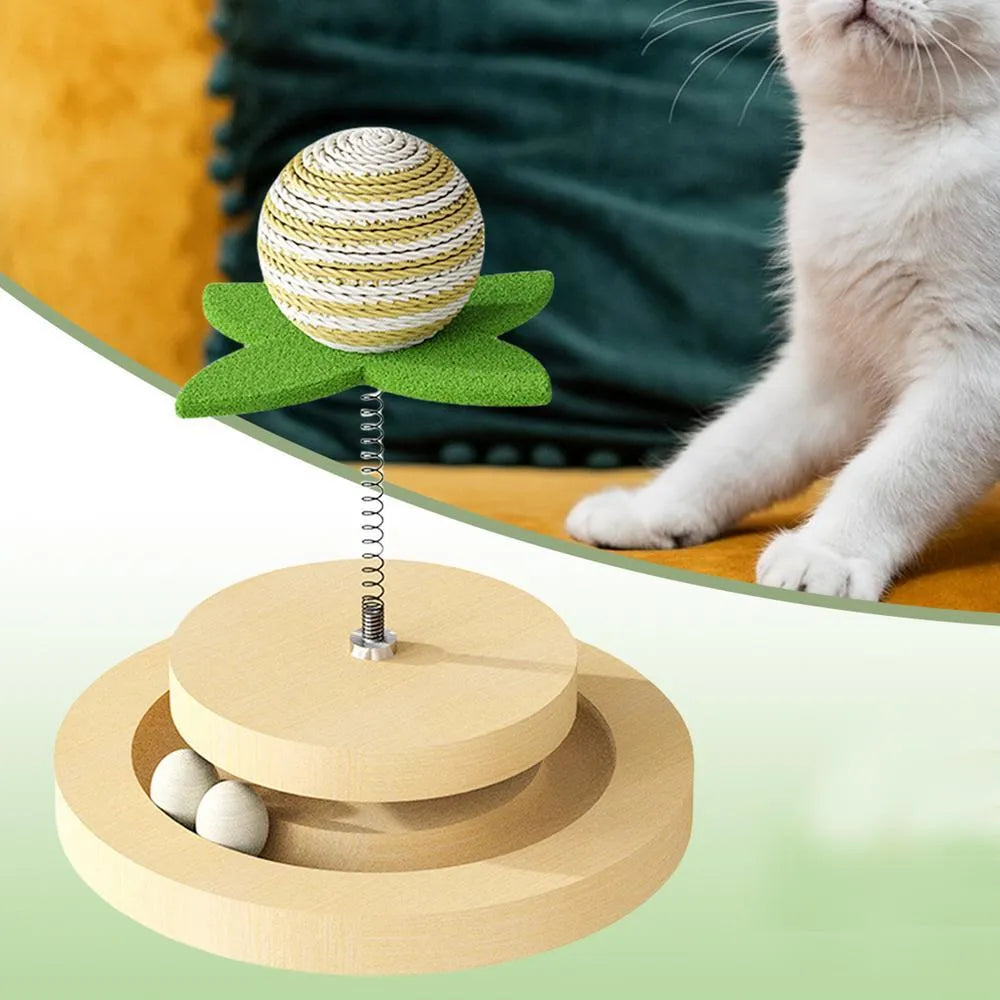 Green sisal scratching pad cat toy with multi-layer circular ball tracks containing rotating balls