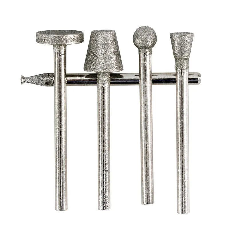 Alloy grinding head with elliptical cone shape and emery abrasive, showing 3mm shank diameter.