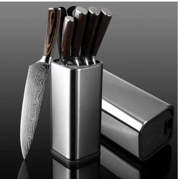 Black and white kitchen tool holder with stainless steel construction and detachable drainage base