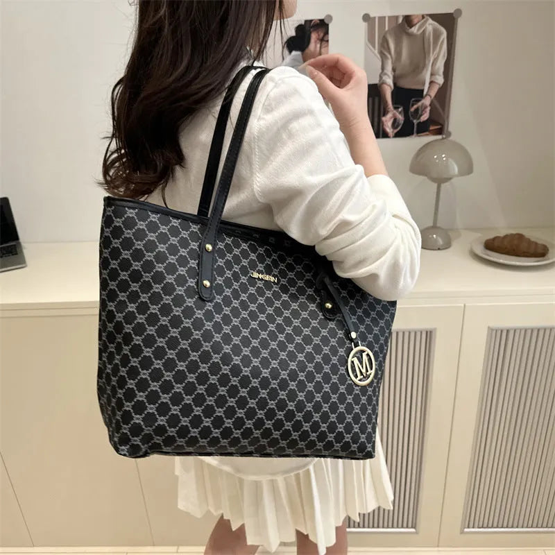 PU material shoulder bag in street-trend style with sewing thread detail, shown in black.