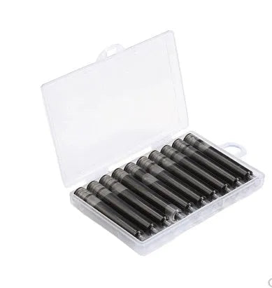 Ten steel ink sacs for fountain pen repair laid out on a surface.