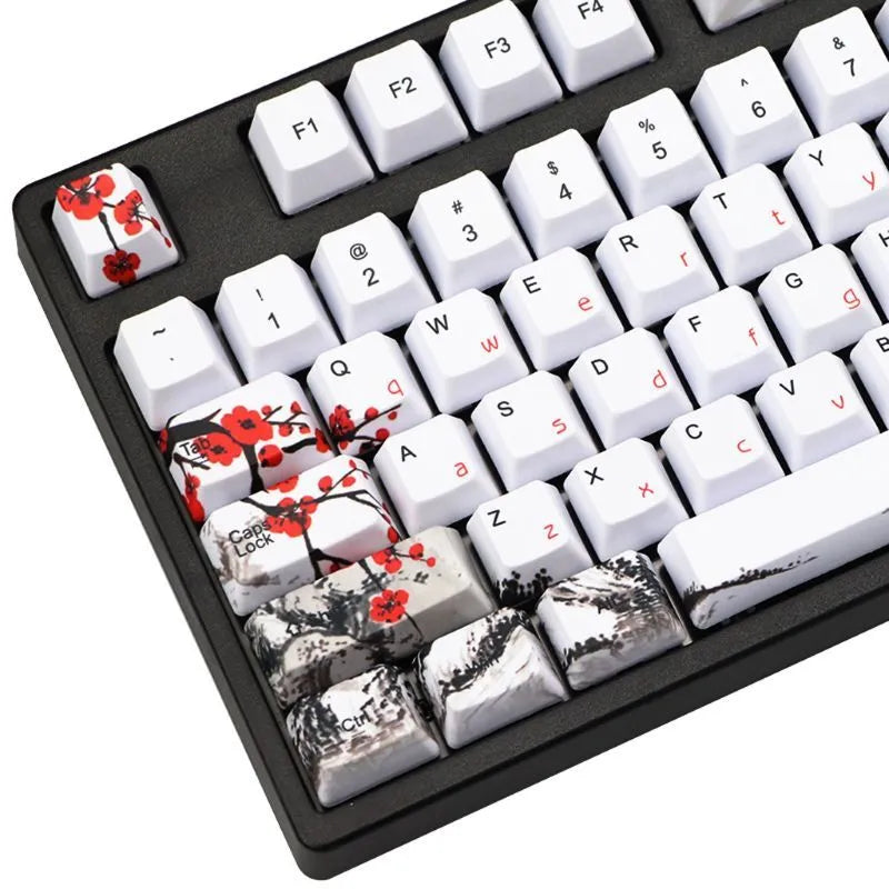 PBT Wangjiang plum blossom theme keycap set with Korean legends on a keyboard.
