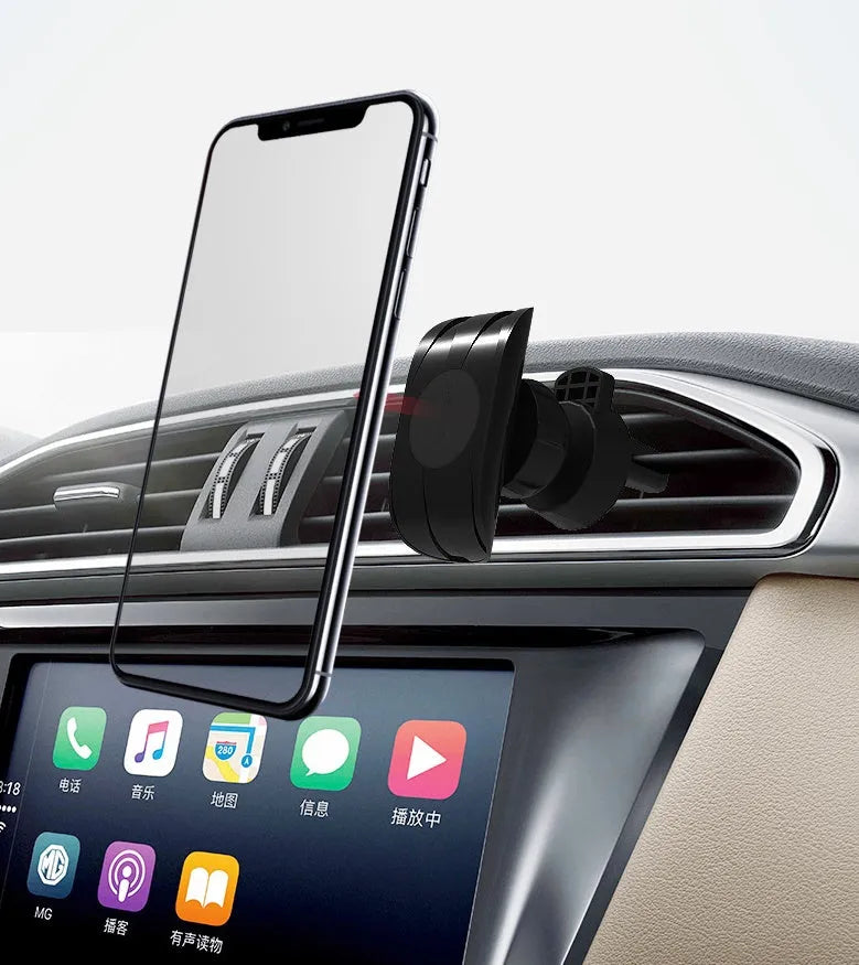 Black car phone holder attached to a car air vent, clamping a smartphone.