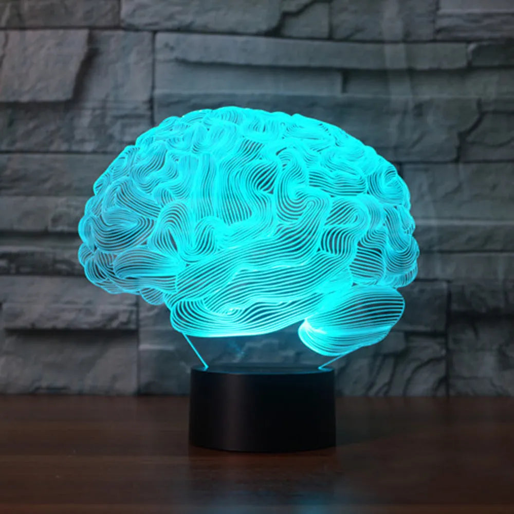 3D acrylic brain-shaped LED desk lamp with colourful lighting on a black ABS base.