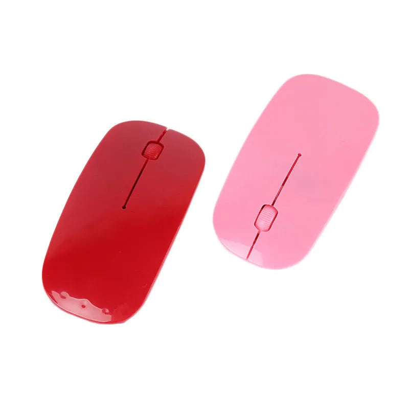 Ultra-thin wireless computer mouse shown in one of six available colours: black, blue, green, pink, red, or white.