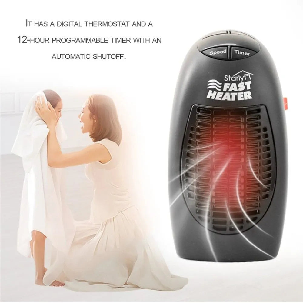 Black mini electric heater with digital display and a rotating plug on a table.