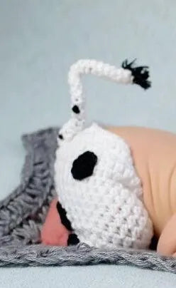 Hand-knitted white newborn cow suit with matching hat and trousers for 0-3 month babies