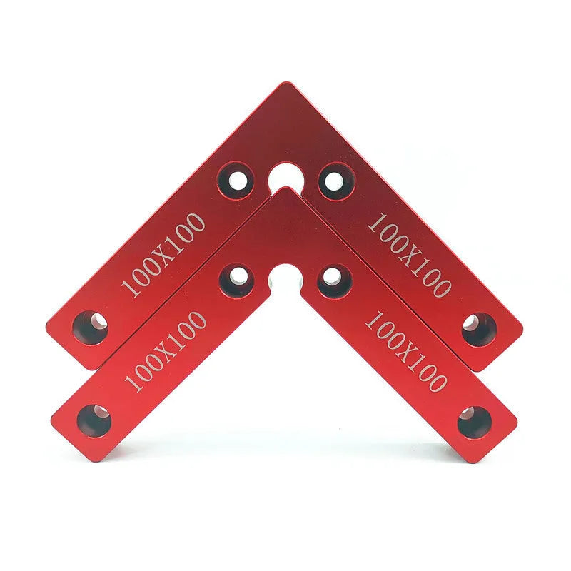 Aluminium right angle positioning block for woodworking jigsaw on a workbench.