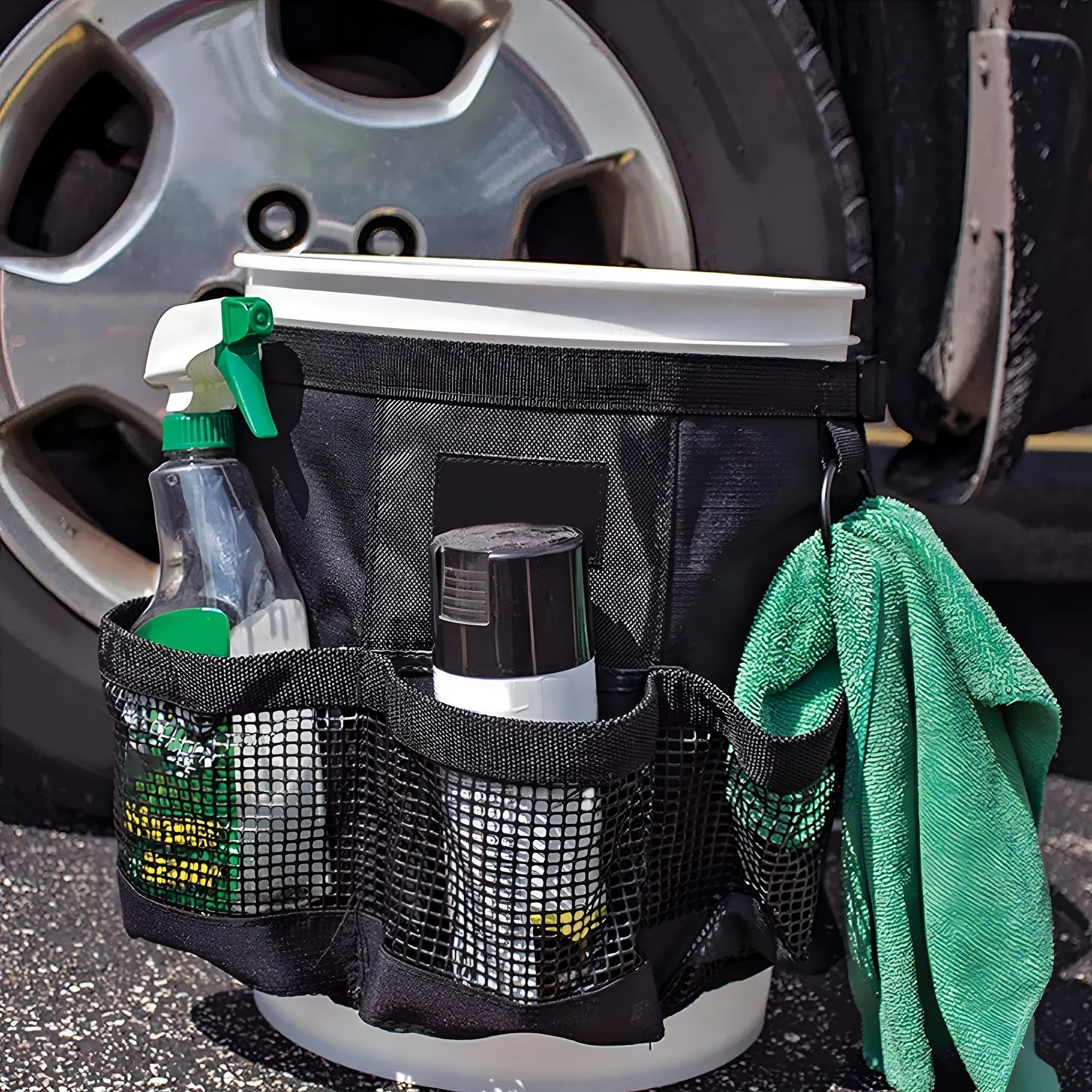 Black cylindrical polyester hanging storage bag designed for a 5-gallon barrel.
