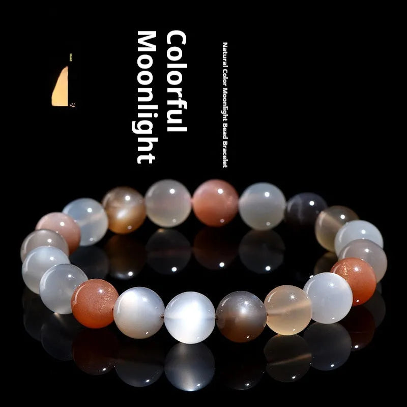 Natural colourful moonlight bracelet with 8mm moonstone beads on a wrist.