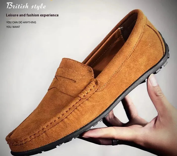 Men's suede leather Gommino-style slip-on casual shoes in brown, shown from the side.