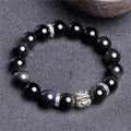 Natural obsidian and silver 999 unisex bracelet in simple style, showing 12mm and 10mm size options.