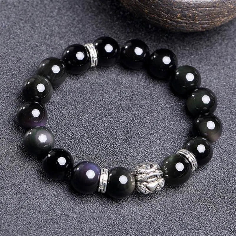Natural obsidian and silver 999 unisex bracelet in simple style, showing 12mm and 10mm size options.