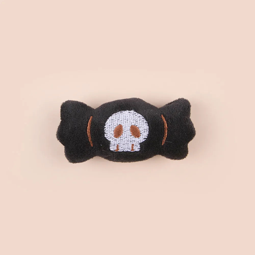 Colourful plush cat teaser wand with candy and eye-shaped attachments for interactive play