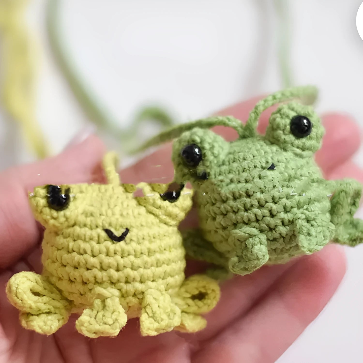 Handmade green plush frog woven pendant for car interior decoration.