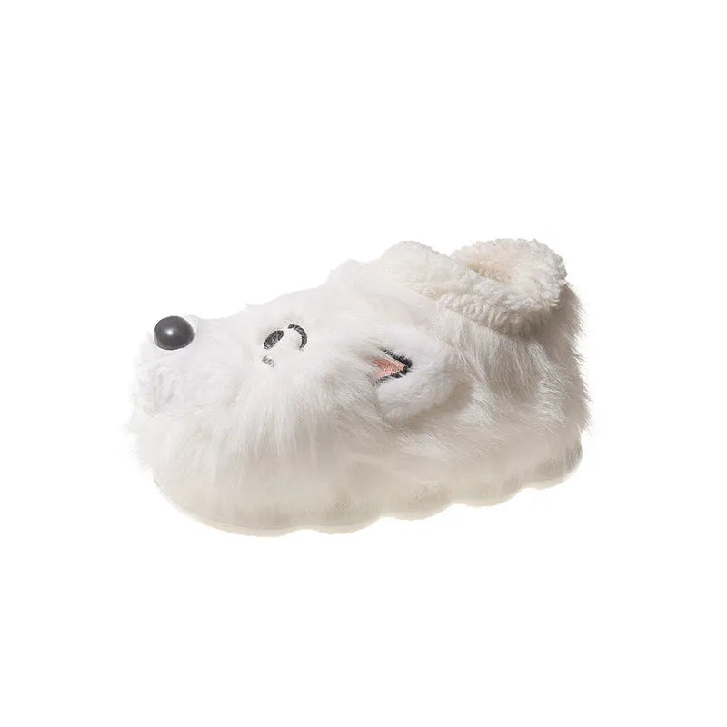 Grey ankle wrap slippers with a plush upper and a non-slip rubber sole, shown on a wooden floor.