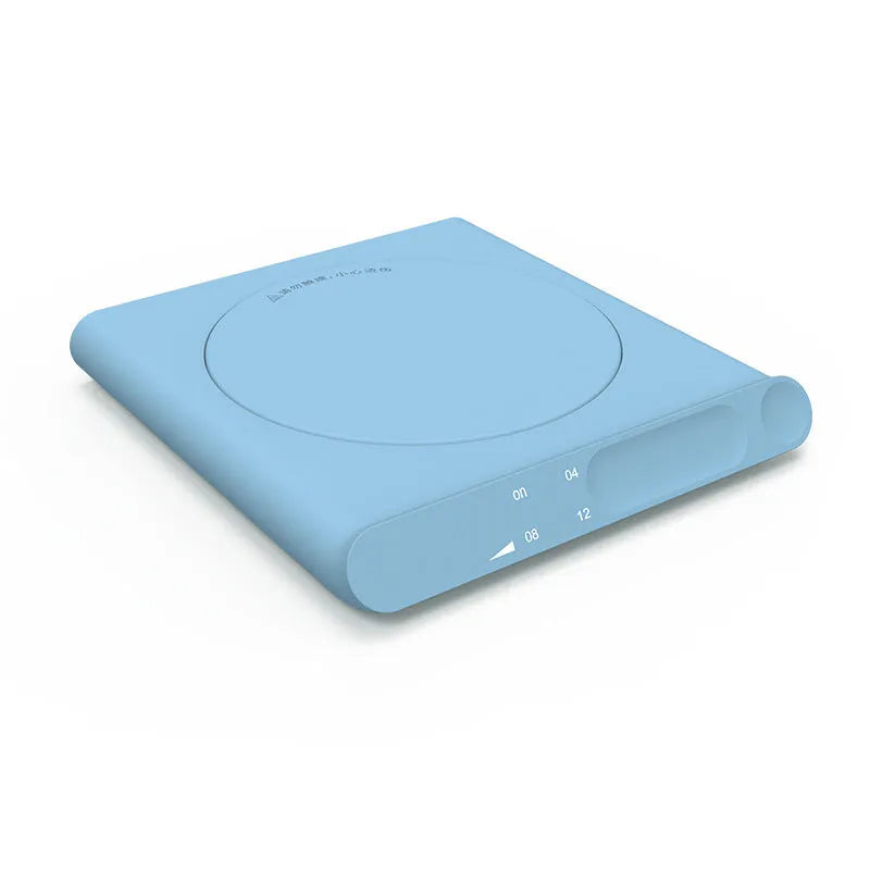 USB-powered heating cup pad in pink or white with mechanical controls